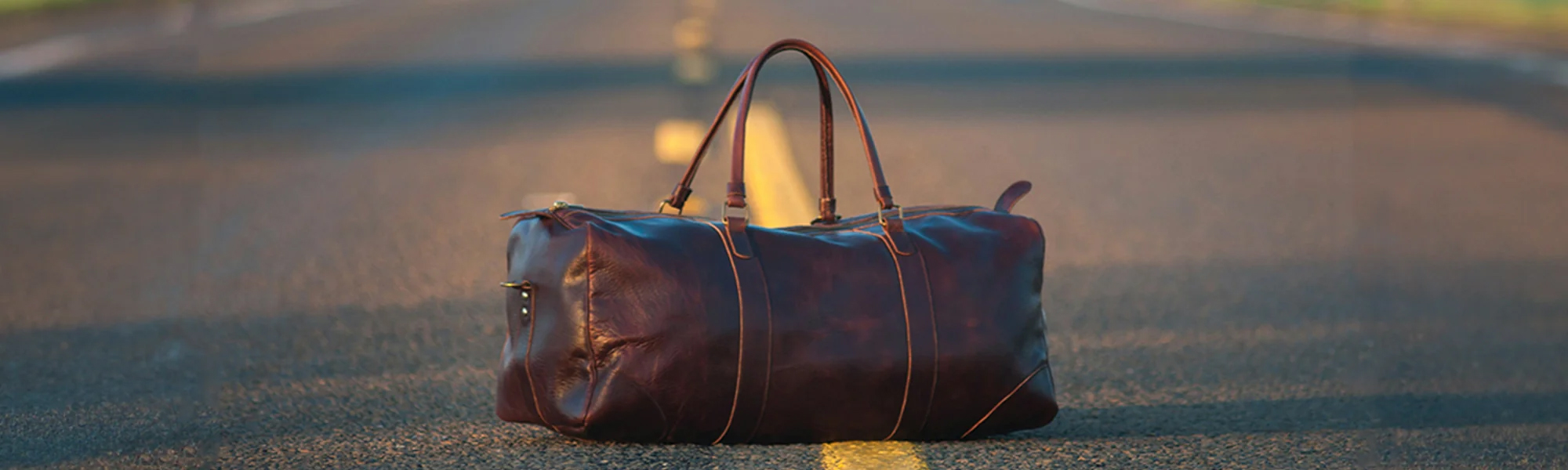 Compact leather cabin bag for easy travel, perfect for overhead compartments and weekend trips.