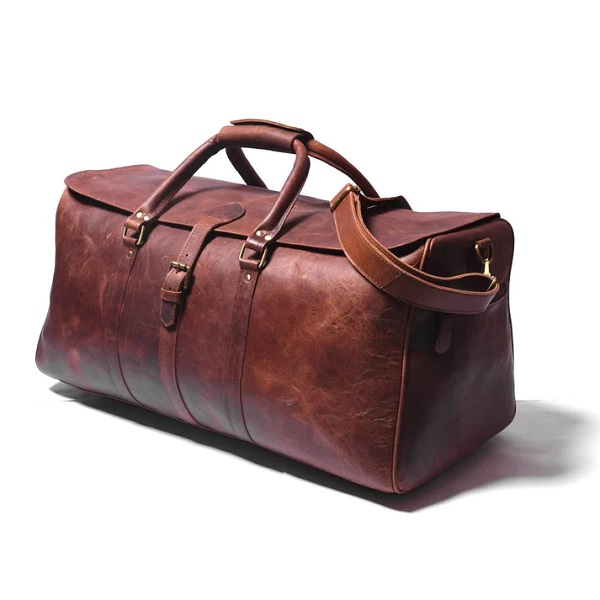 Full grain buffalo leather bag, Leather bag with brass hardware, Brown leather bag, Leather bag for travel, Leather bag for men, Leather bag with cotton lining, Leather bag for essentials, Leather bag size options, Premium leather bag, Stylish leather bag, Durable leather bag, Leather bag for work, Leather bag for daily use